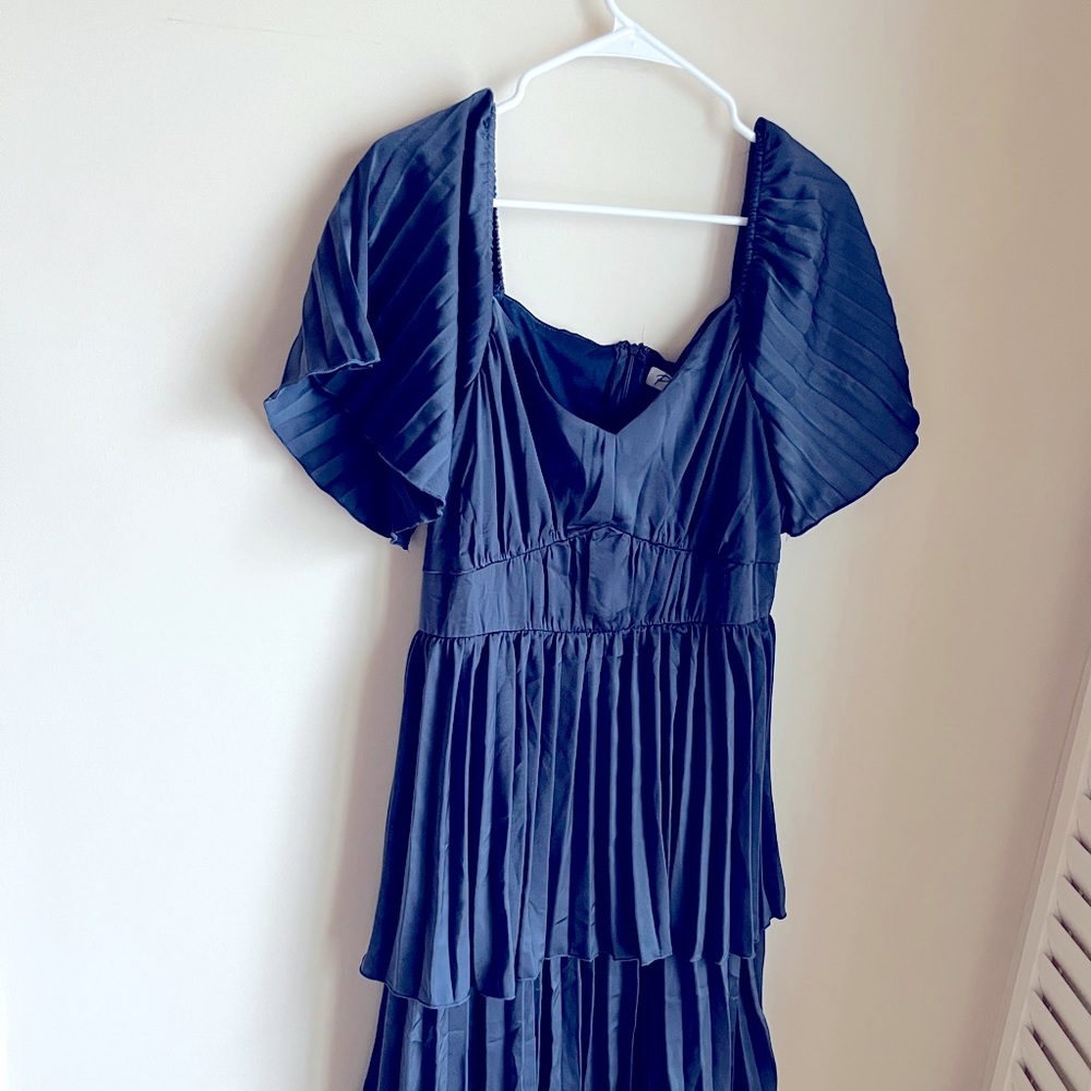Women’s boutique dress (brand:Polagram). Tags attached. Never worn.